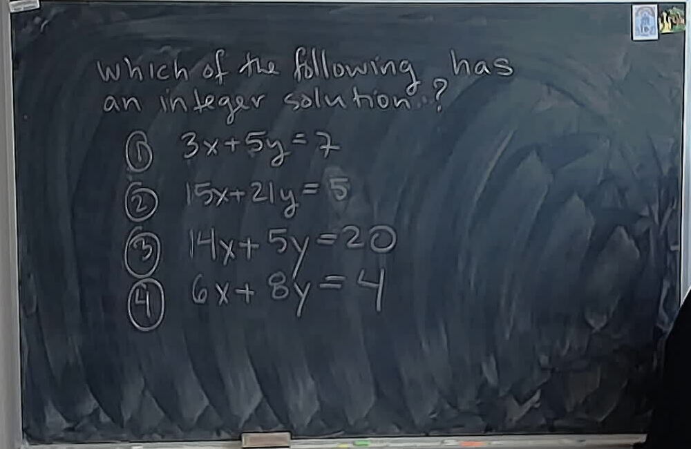A02 MCQ: Which Diophantine Equation Has a Solution? A photo of a whiteboard titled: A02 MCQ: Which Diophantine Equation Has a Solution?